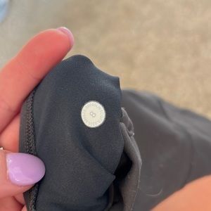 gray leggings align with pockets